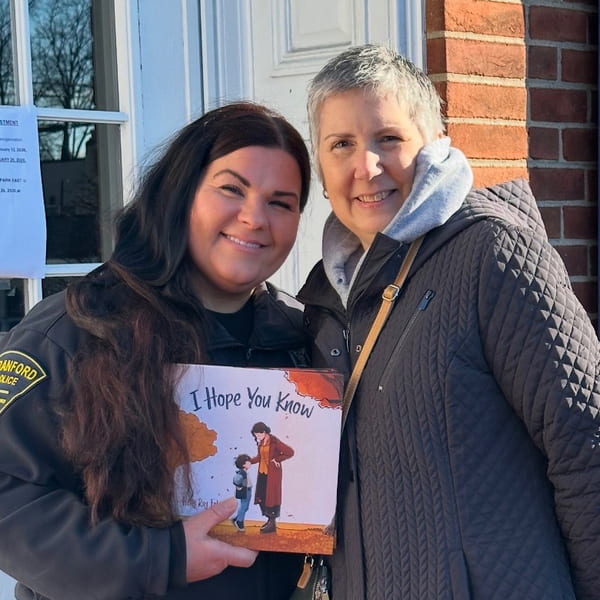 Officer Kelly Pellino with Holly Folgia.